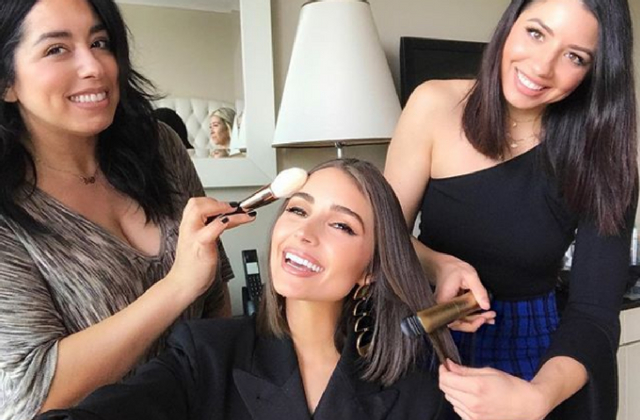 I love that everybody takes so much time on their beauty regime. You can tell that everybody has a different look, whether it's something they try on their face or a different hairstyle. And everybody smells so good! Olivia Culpo with Justine Marjan (right)